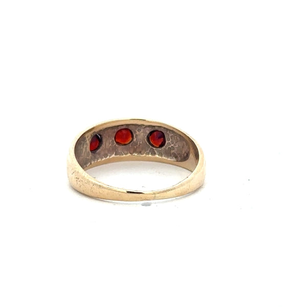 9ct yellow gold ring in size Q with a smooth band, unbranded jewelry piece, photographed against a plain background.