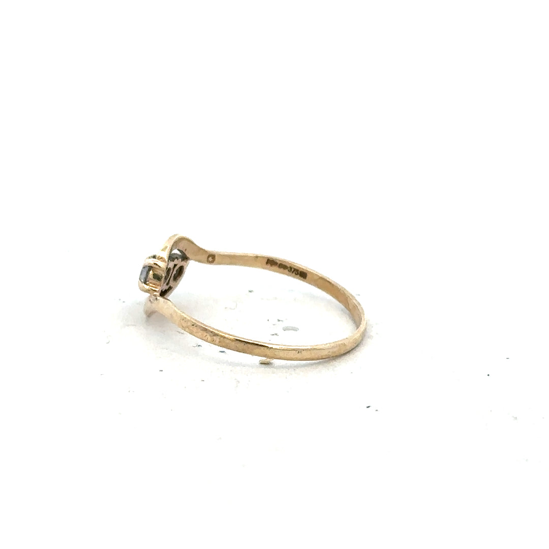 Yellow gold ring in size Q, unbranded 9ct gold jewelry, featuring a smooth polished band design.