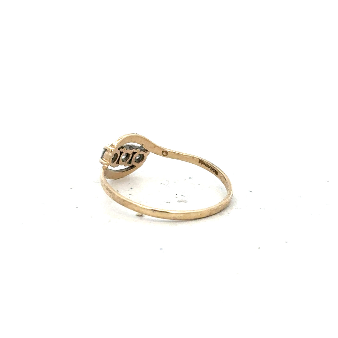 9ct yellow gold ring size Q with a smooth polished band, unbranded jewelry accessory.