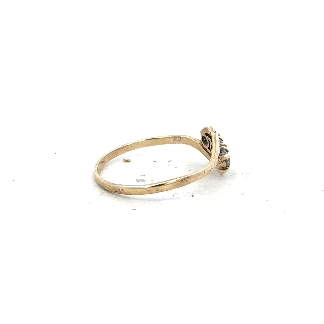 9ct yellow gold ring in size Q with a smooth band, unbranded jewelry piece displayed on a plain background.