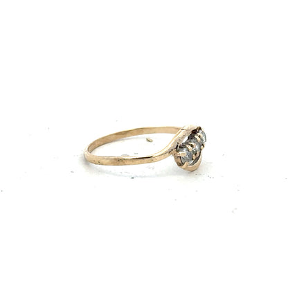 9ct yellow gold ring in size Q with a smooth polished band, unbranded jewelry, close-up view of the ring.