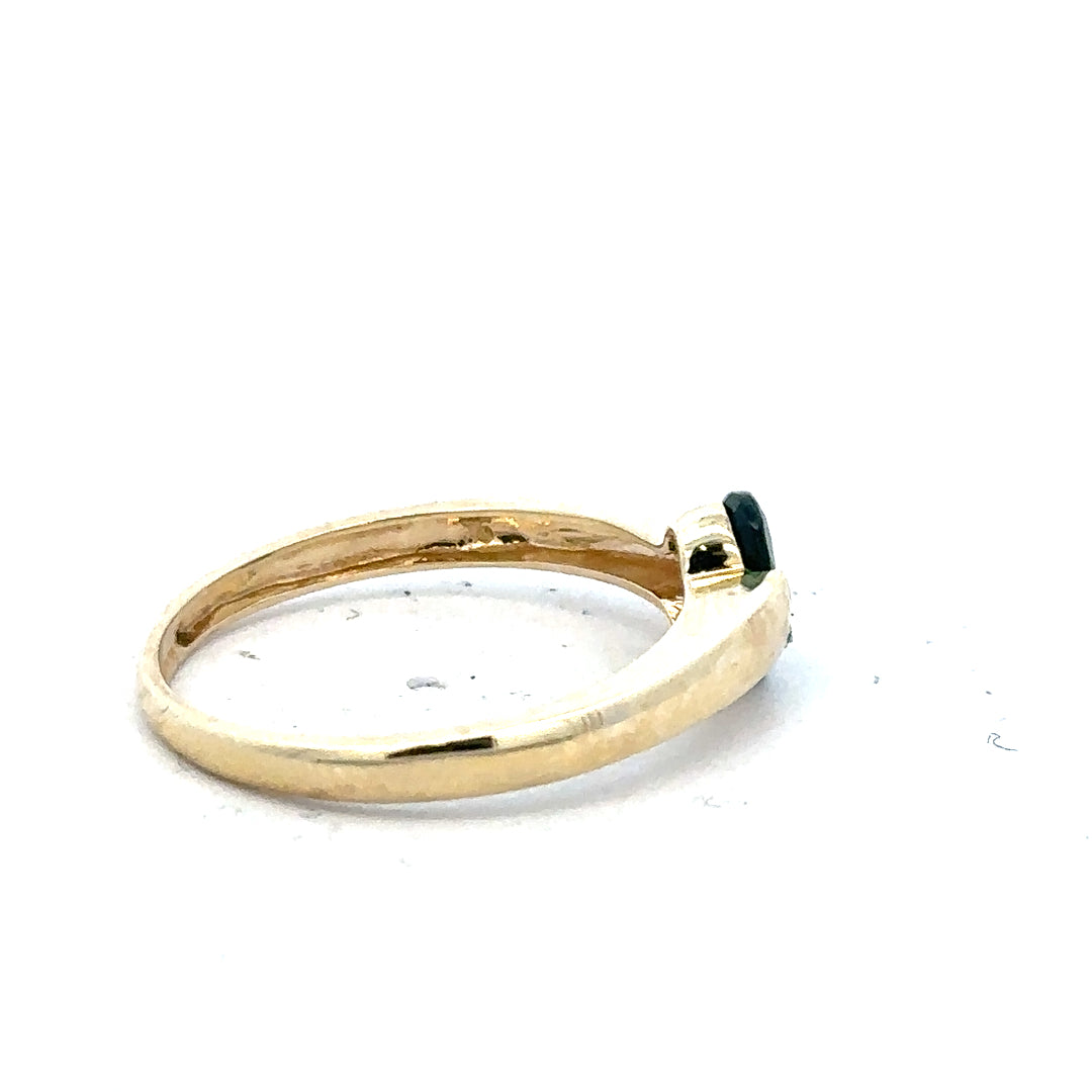 9ct yellow gold ring in size R with a simple band design, unbranded jewelry shown on a neutral background.