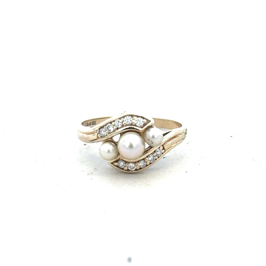 9ct yellow gold ring in size R with a smooth band, showcasing a polished finish and classic design.