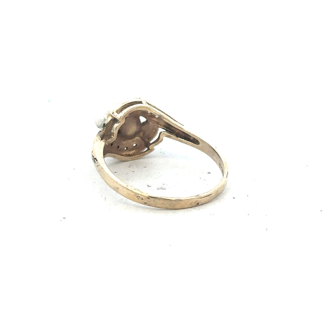 Yellow gold ring in size R, 9 carat, unbranded, with a simple smooth band design.