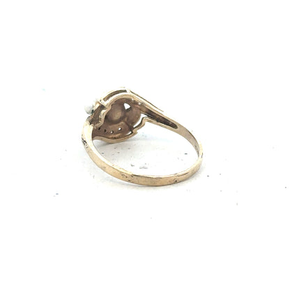 Yellow gold ring in size R, 9 carat, unbranded, with a simple smooth band design.
