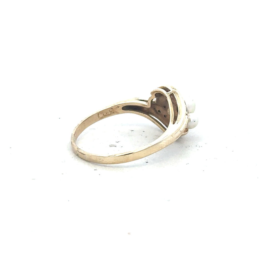 9ct yellow gold ring in size R, unbranded, showcasing a smooth polished band with a simple, elegant design.