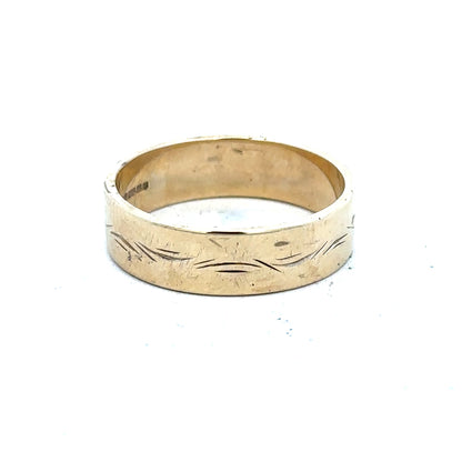 9ct yellow gold ring in size S with a simple band design, unbranded jewelry displayed on a white background.