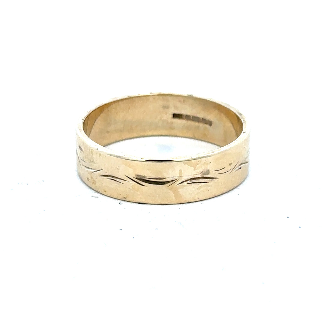 9ct yellow gold ring in size S with a simple band design, unbranded jewelry piece.