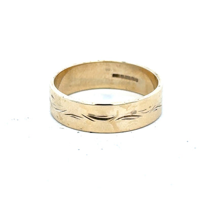 9ct yellow gold ring in size S with a simple band design, unbranded jewelry piece.