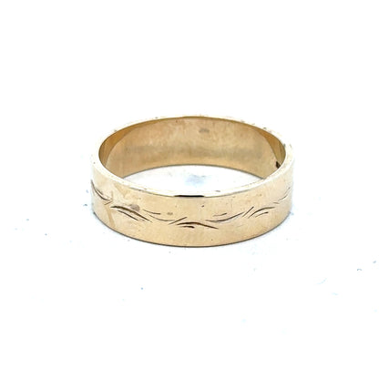 9ct yellow gold ring in size S, unbranded, showcasing a smooth band with a polished finish.