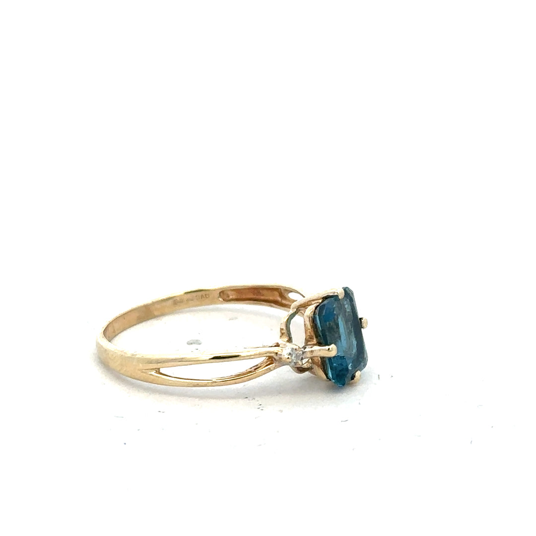9ct yellow gold ring in size S with a smooth band, unbranded jewelry piece displayed on a neutral background.