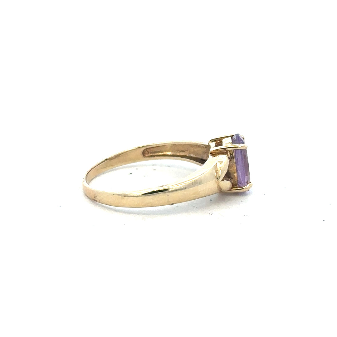 9ct yellow gold ring in size S with a smooth band, unbranded jewelry piece displayed against a neutral background.
