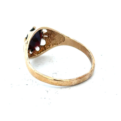 9ct yellow gold ring in size T with a smooth band, unbranded jewelry piece displayed on a plain background.