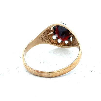 9ct yellow gold ring in size T with a smooth polished band, unbranded, showcasing elegant jewelry craftsmanship.