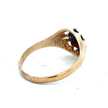 9ct yellow gold ring in size T with a smooth band, unbranded jewelry piece visible on a plain background.