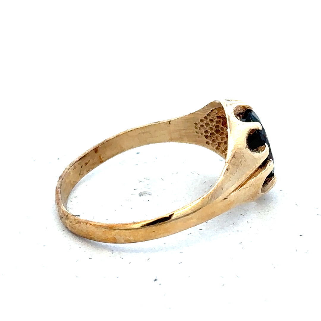9ct yellow gold ring in size T with a smooth band, unbranded jewelry piece on a neutral background.