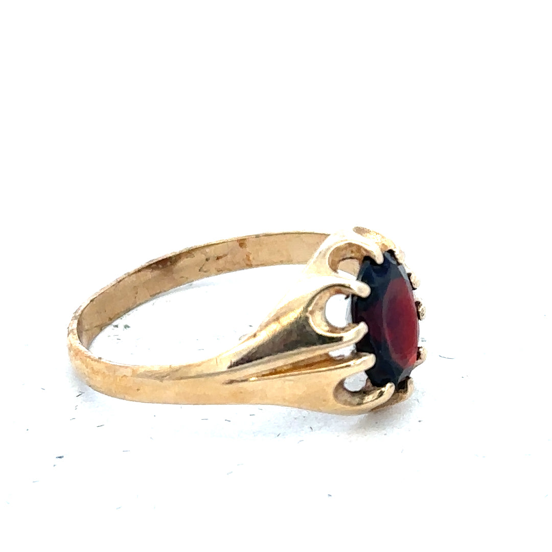 9ct yellow gold ring in size T with a simple band design, unbranded jewelry displayed on a plain background.