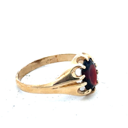 9ct yellow gold ring in size T with a simple band design, unbranded jewelry displayed on a plain background.