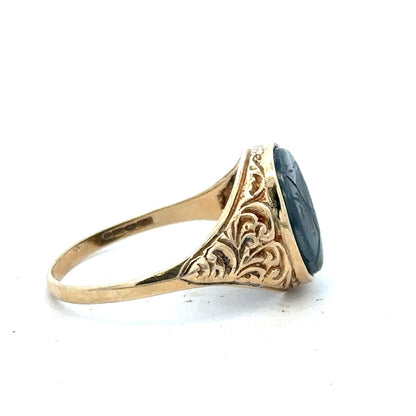 9ct yellow gold ring size T with a smooth band, unbranded jewelry piece on a plain background