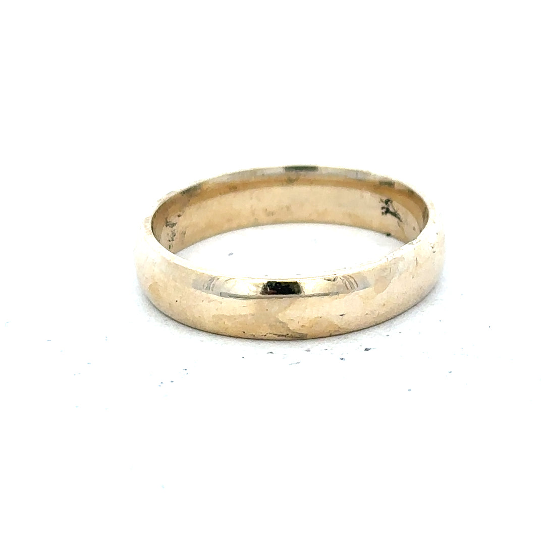 9ct yellow gold ring in size T1/2 with a smooth band, displayed against a neutral background.