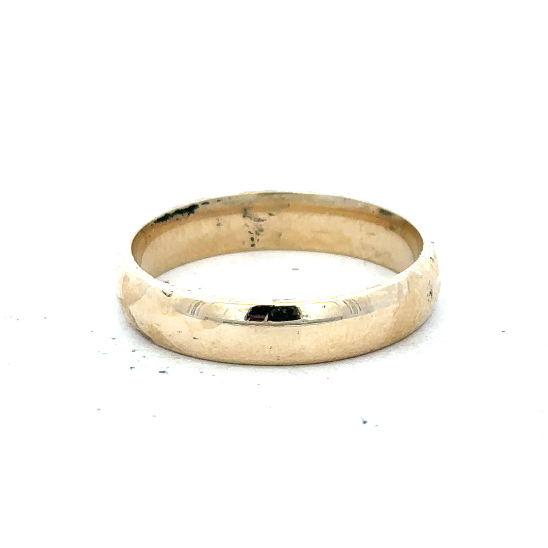 Yellow gold ring in size T1/2 with a smooth band, unbranded 9ct gold jewelry displayed against a neutral background.