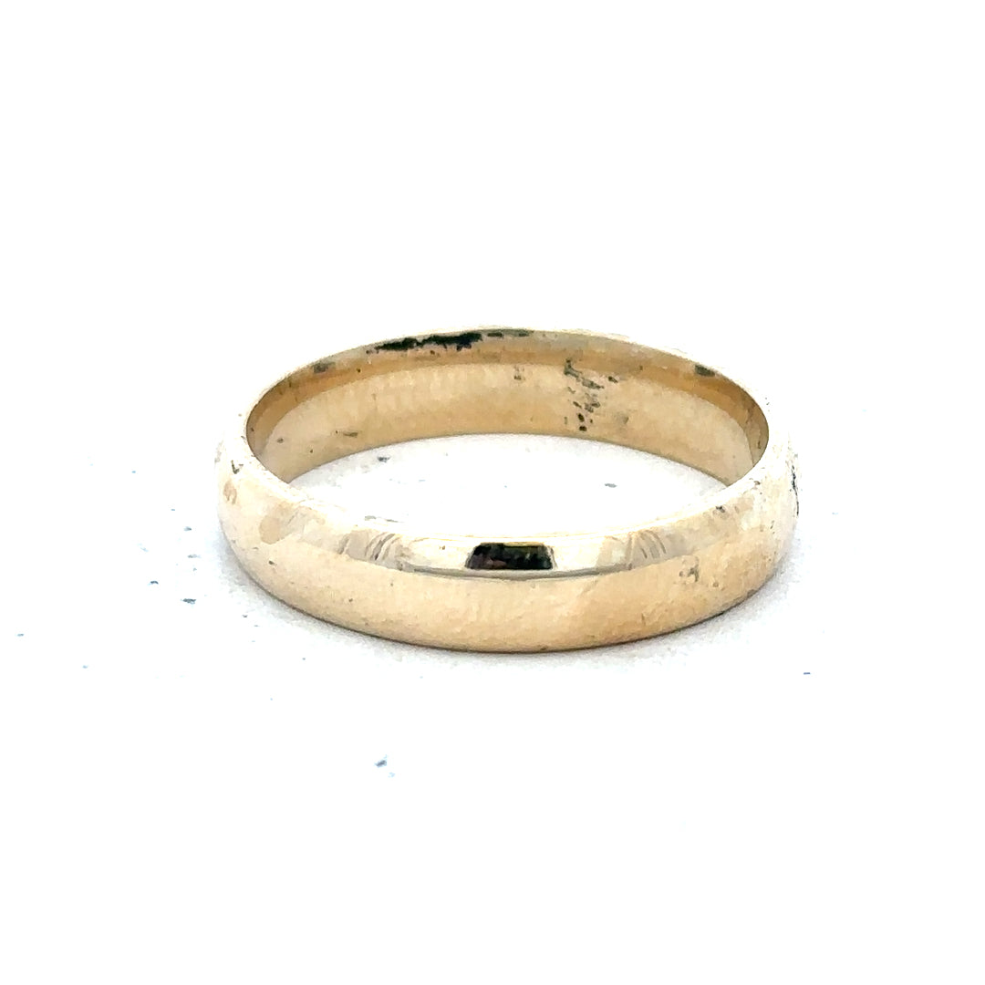 9ct yellow gold ring in size T1/2 with a smooth band, unbranded jewelry showcasing classic gold craftsmanship.