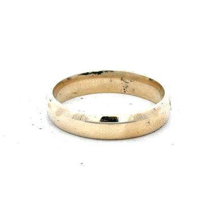 9ct yellow gold ring in size T1/2 with a smooth band, unbranded jewelry showcasing classic gold craftsmanship.