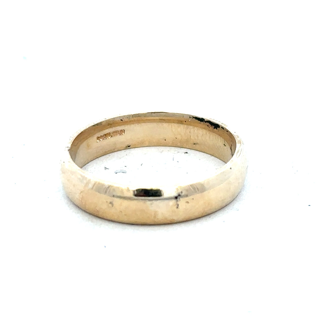 9ct yellow gold ring in size T1/2 with a simple band design, unbranded, displayed on a neutral background.