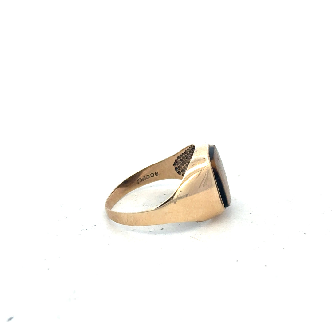 9ct yellow gold ring size T1/2 with smooth band, unbranded jewelry, shown in a close-up view of the gold ring.