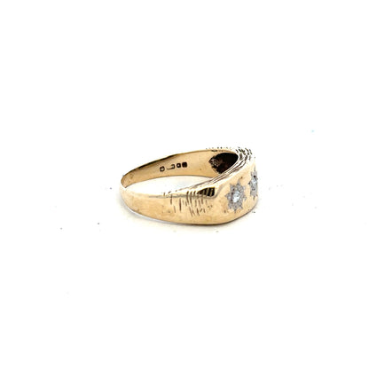 9ct yellow gold ring in size W with a smooth band, unbranded jewelry showing a close-up view of the polished gold surface.