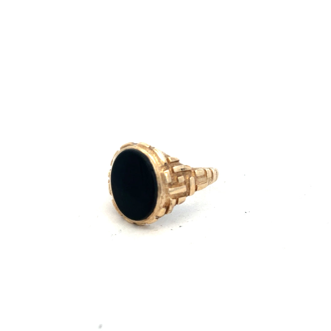 9ct yellow gold ring in size W with a smooth band, unbranded, shown from a side view.