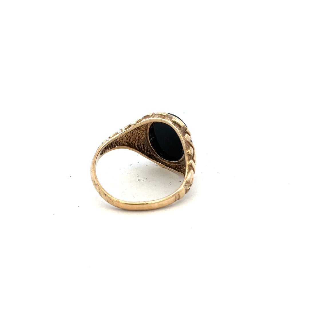 9ct yellow gold ring in size W with a smooth band, unbranded, shown on a plain background.
