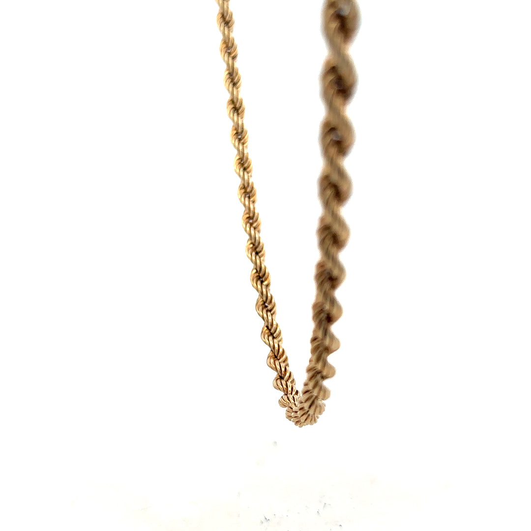 9ct yellow gold rope chain weighing 10.1g, showing the detailed twisted design and polished finish.