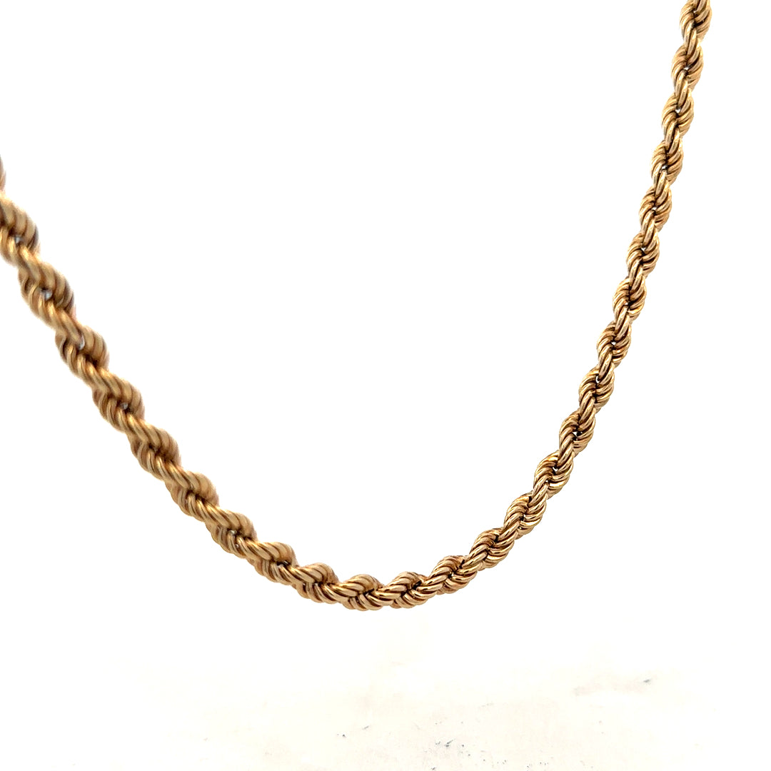 9ct yellow gold rope chain, unbranded, 10.1g, close-up of intricate twisted gold links, shiny and smooth surface.
