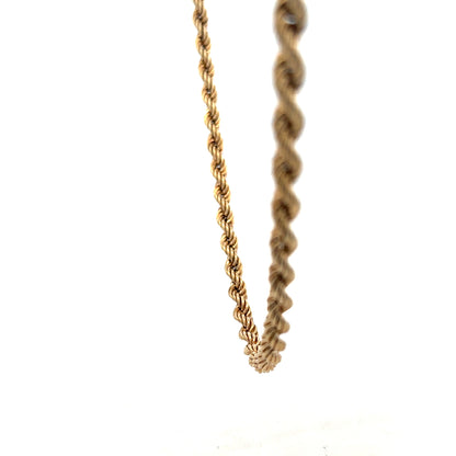 9ct yellow gold rope chain with a polished finish, weighs 10.1g, showcasing a detailed twisted link design.