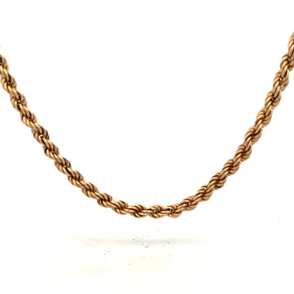 9ct yellow gold rope chain, 15.1g, unbranded, detailed close-up showing twisted gold links and shiny finish.