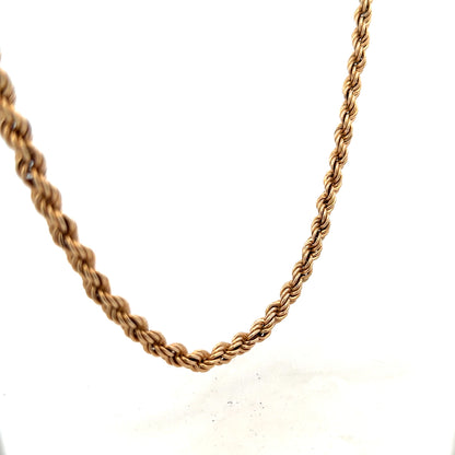 9ct yellow gold rope chain weighing 15.1g, featuring a classic twisted design, displayed against a neutral background.