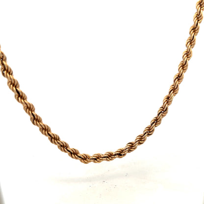 9ct yellow gold rope chain with a thick, twisted design, weighing 15.1 grams, showcasing a classic jewelry style.