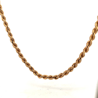 9ct yellow gold rope chain, unbranded, weighing 15.1g, with intricate twisted design and polished finish.