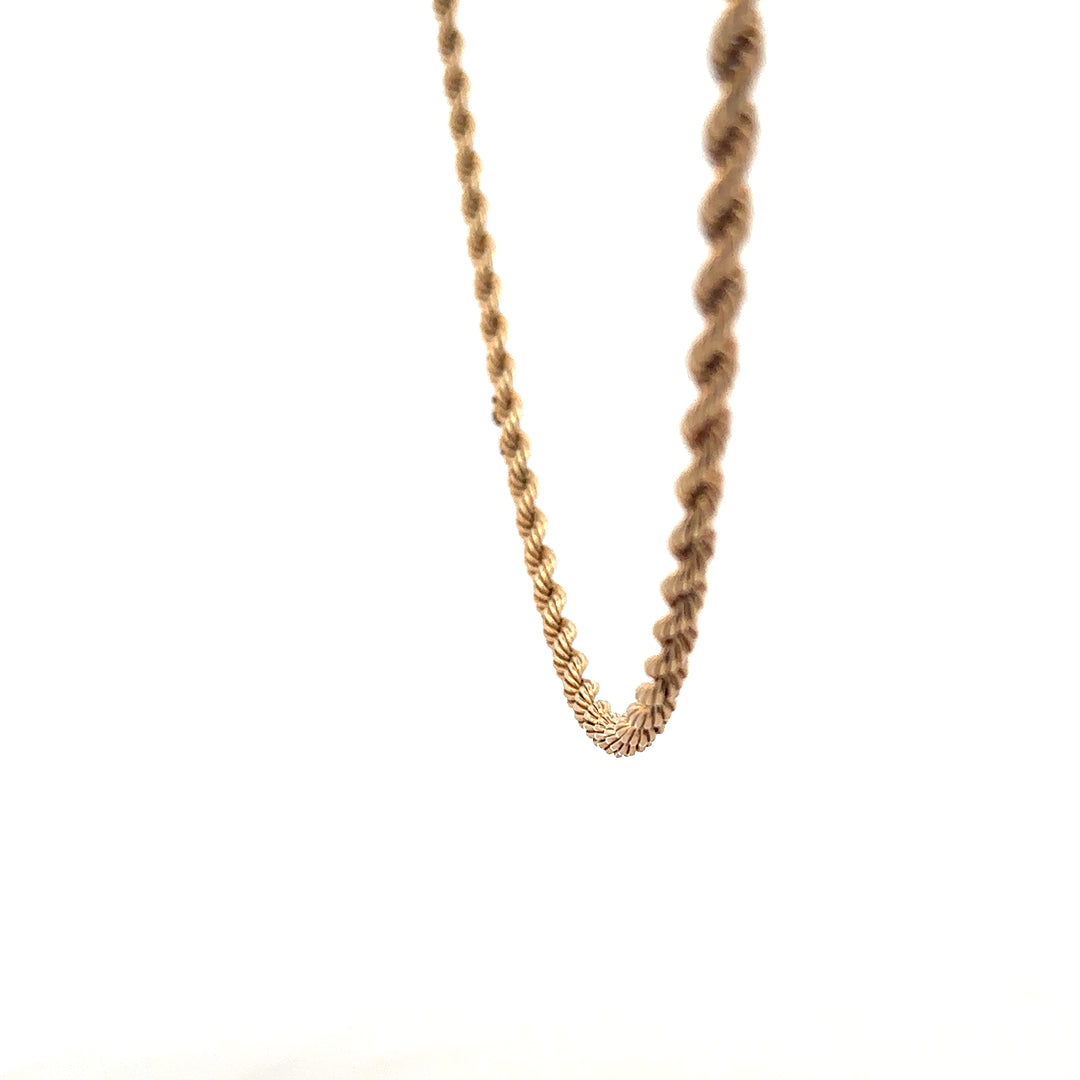 9ct yellow gold rope chain weighing 5.5g, featuring classic twisted design, unbranded jewelry showcase.