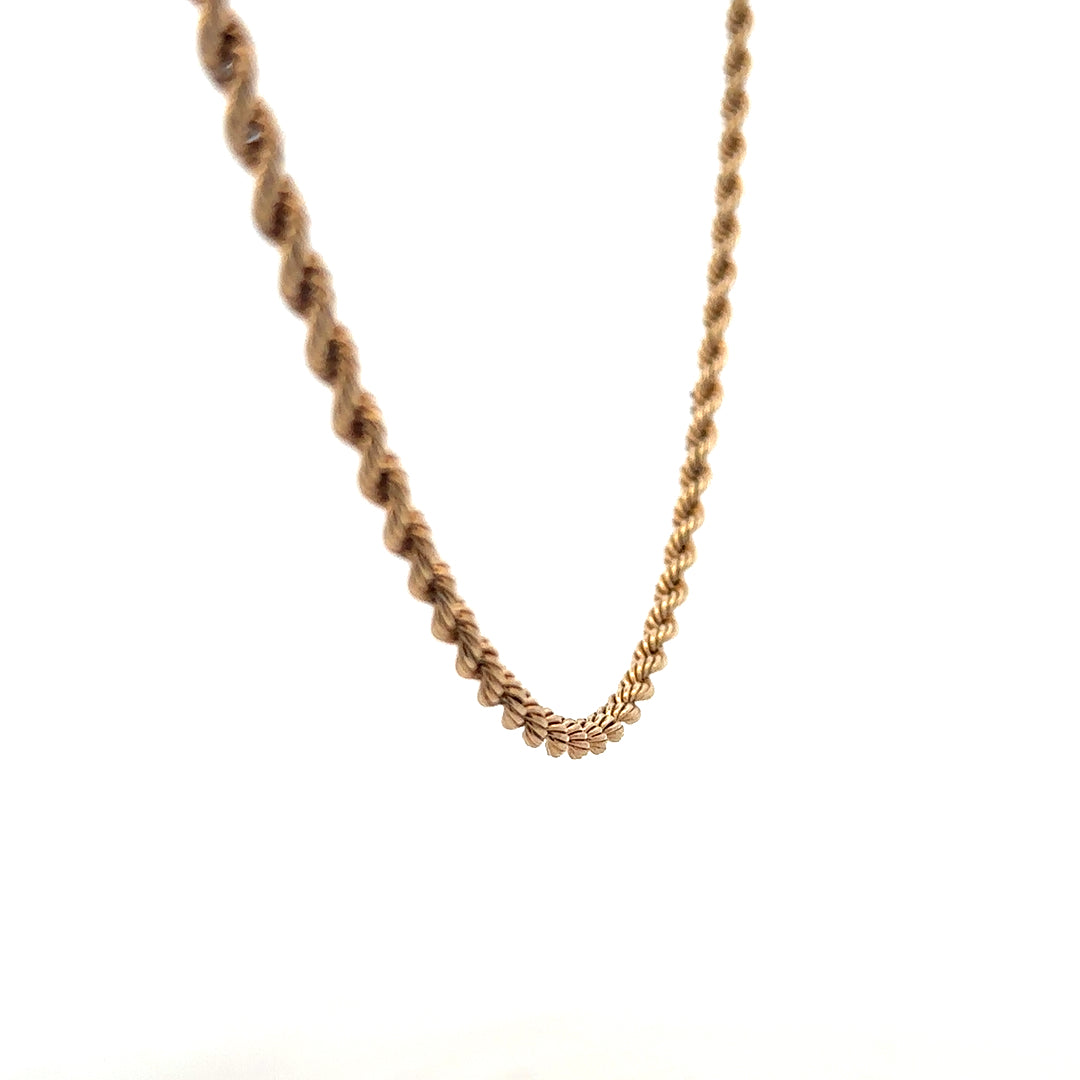 9ct yellow gold rope chain weighing 5.5g, featuring intricate twisted design and polished finish, unbranded jewelry accessory.