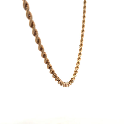 9ct yellow gold rope chain weighing 5.5g, featuring intricate twisted design and polished finish, unbranded jewelry accessory.