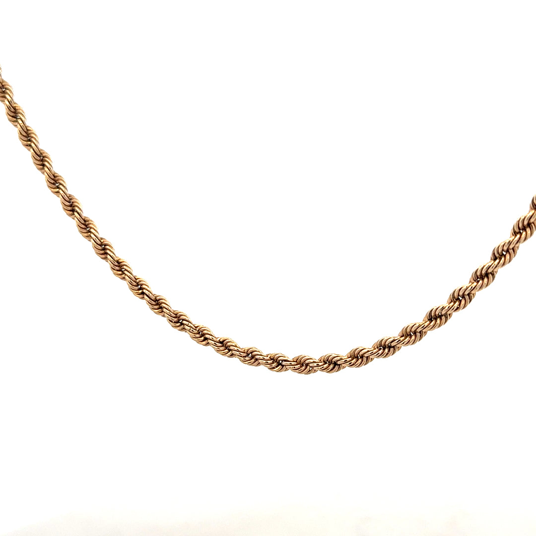 9ct yellow gold rope chain weighing 5.5g, showcasing its twisted design and shiny finish in a close-up view.