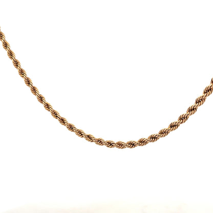 9ct yellow gold rope chain weighing 5.5g, showcasing its twisted design and shiny finish in a close-up view.
