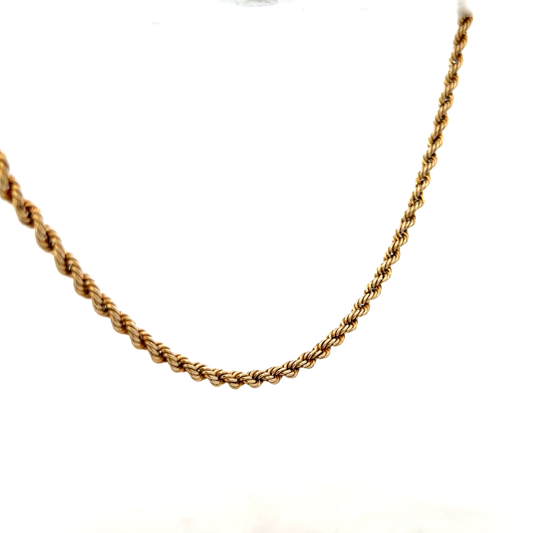 9ct yellow gold rope chain weighing 7.2g, showcasing its twisted gold design and polished finish.