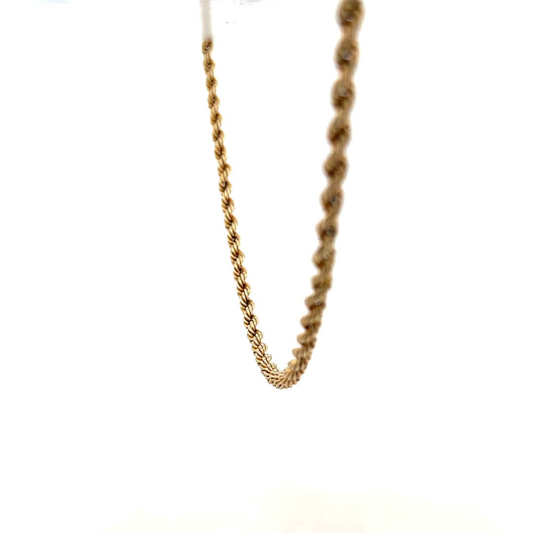 9ct yellow gold rope chain weighing 7.2g, unbranded jewelry with intricate twisted design and polished finish.
