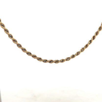 9ct yellow gold rope chain, 7g, unbranded, featuring intricate twisted design and polished finish, close-up view.