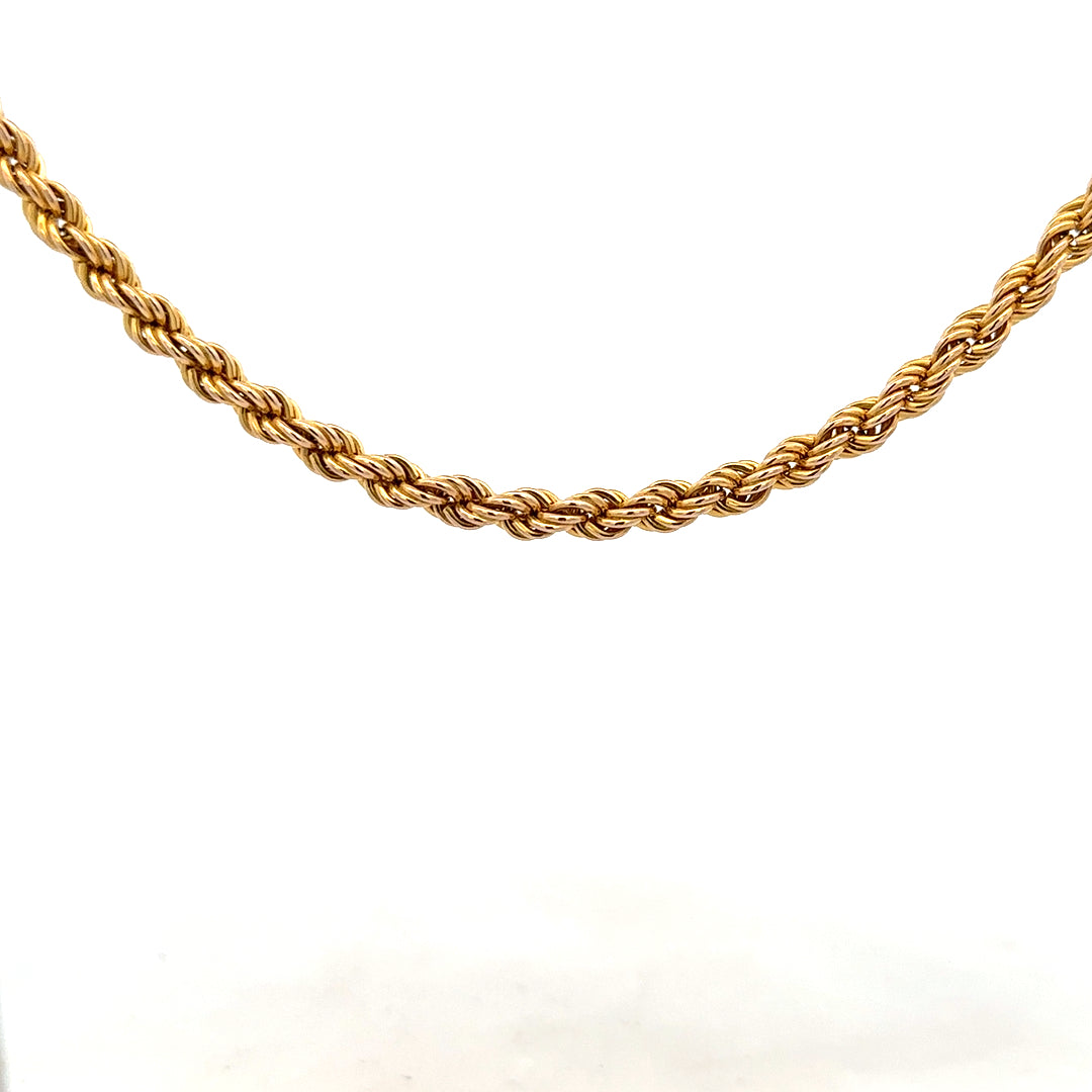 9ct yellow gold rope chain weighing 9.4g, featuring a detailed twisted design, unbranded jewelry accessory