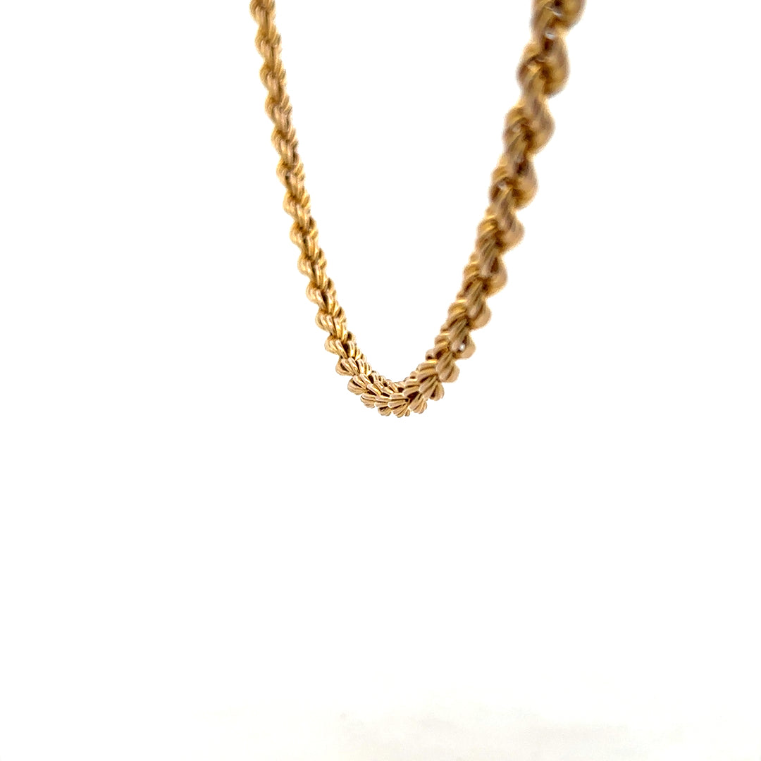 9ct yellow gold rope chain weighing 9.4 grams, unbranded jewelry with detailed twisted design and polished finish.