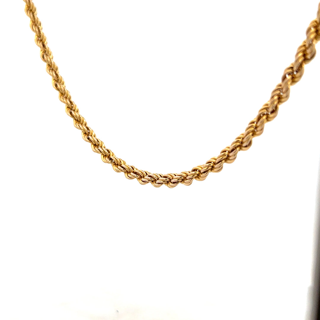 9ct yellow gold rope chain weighing 9.4g, featuring a detailed twisted design, shown in close-up on a plain background.